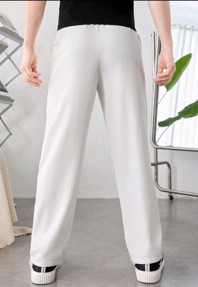 SHEIN Teen Boy Casual Tapered Pants With Pleat Design And Pockets