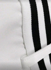 Elegant White High-Waisted Pleated Skirt With Black Button Accents - Stylish All-Season Fashion for women