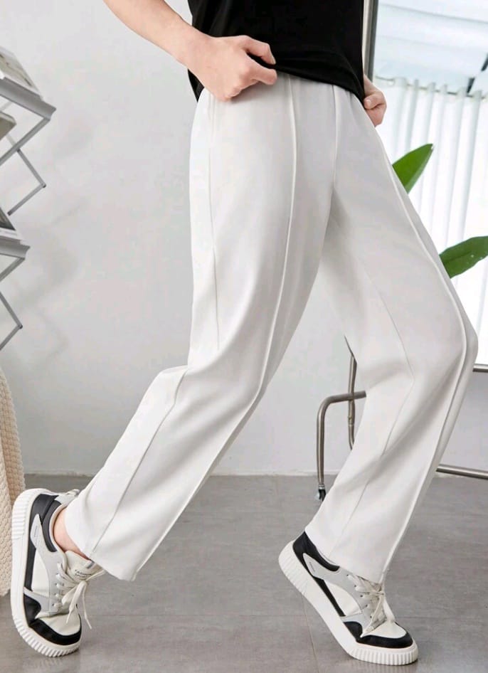 SHEIN Teen Boy Casual Tapered Pants With Pleat Design And Pockets